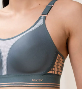 TRIUMPH <BR>
Unpadded Triaction Extreme Lite Sports Bra <BR>
White with peach trim <BR>